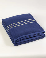 Navy Blue Chateau Turkish cotton bath sheet, folded on a soft studio backdrop 