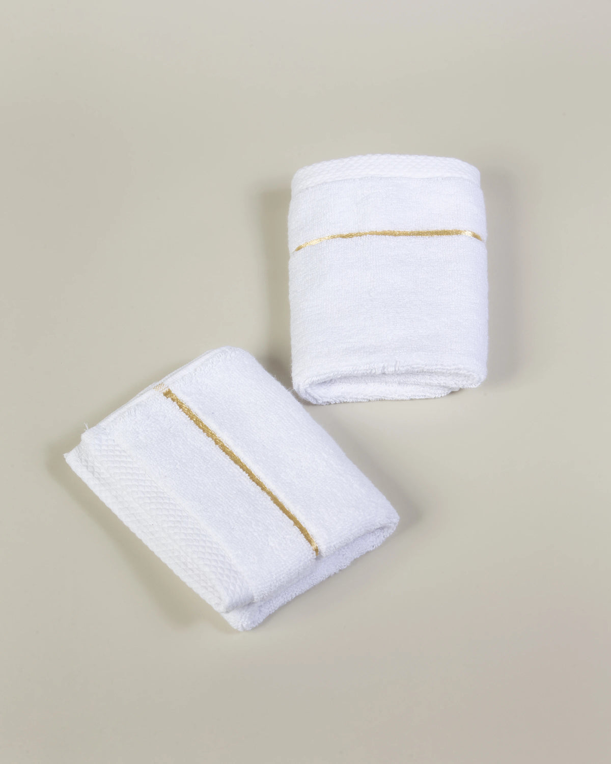 White Chateau Turkish cotton face towel, pair folded on a soft studio backdrop 