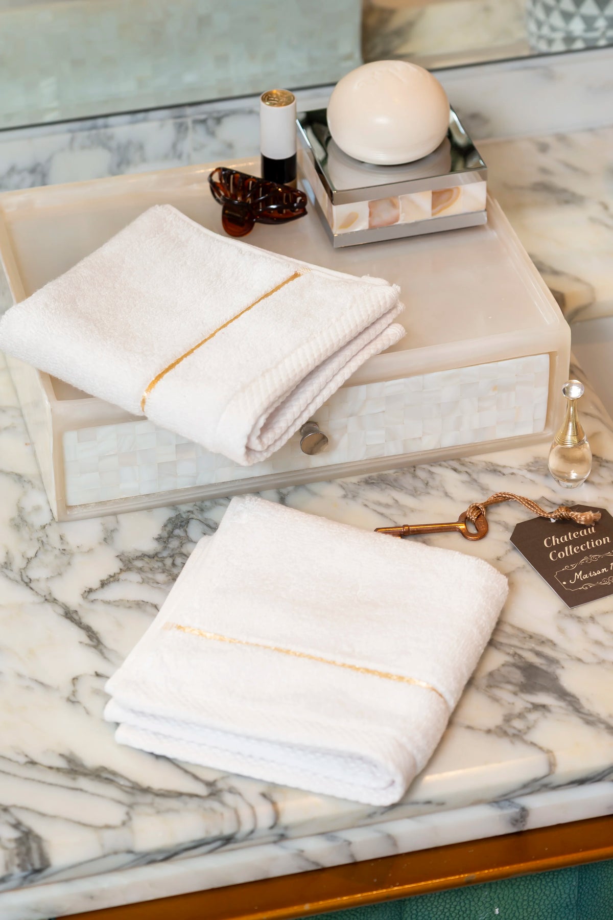 White Chateau Turkish cotton face towel, on a marble vanity 