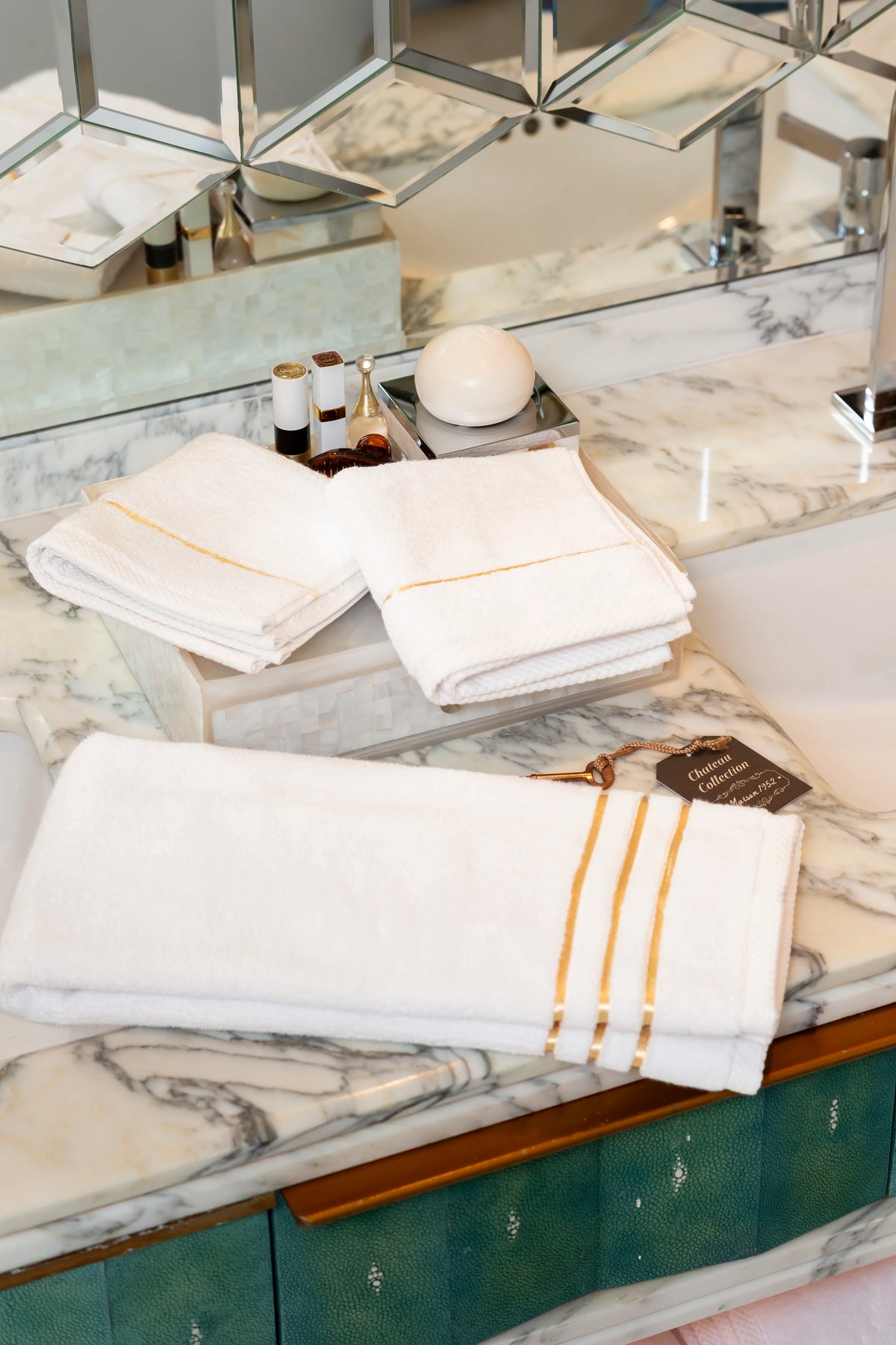 White Chateau Turkish cotton hand towel, on a marble vanity 