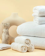 Retreat Complete Set: nine pieces of white cotton bath linen — bath towels, hand towels, face towels and bath mat